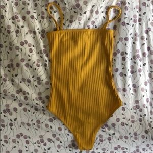 NWOT Mustard body with straps